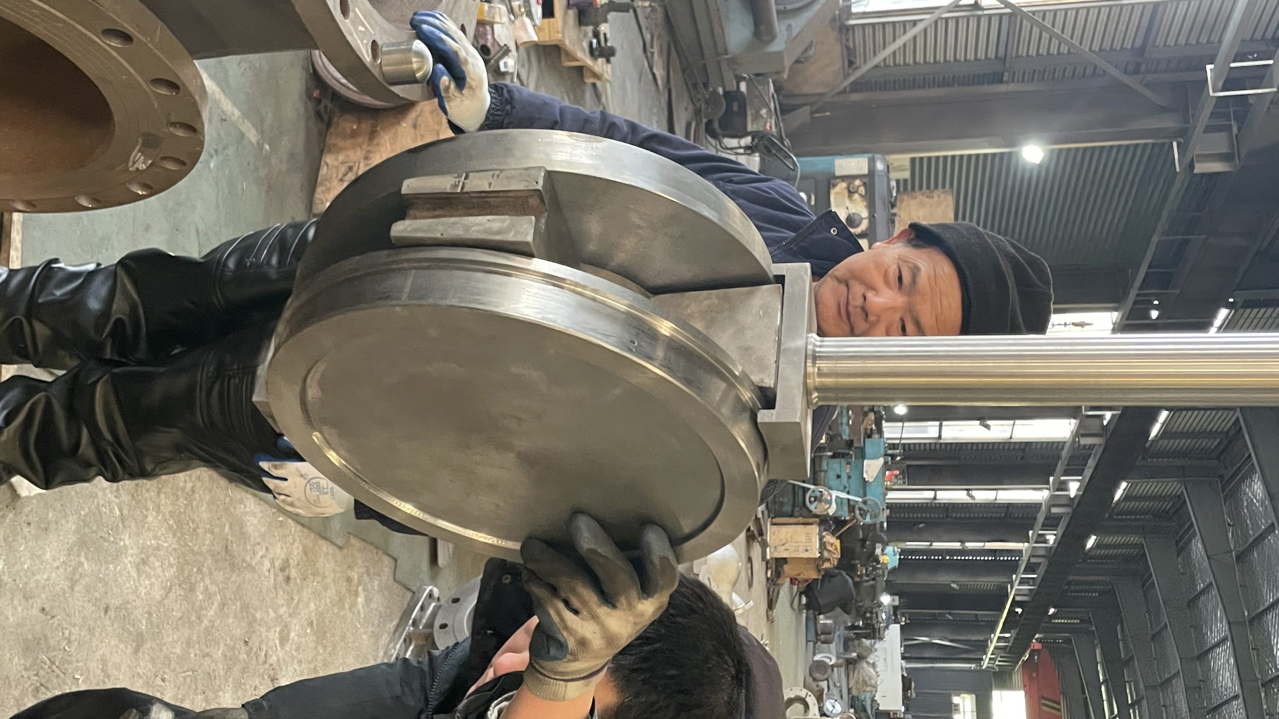 Workshop technicians performing fit-up of the DN400 PN25 gate assembly